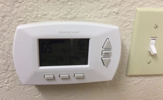 How to Remove Cover of Honeywell Thermostat