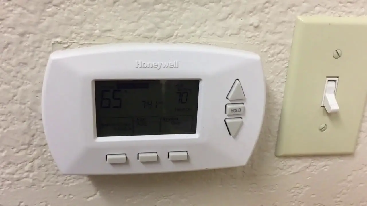 How to Remove Cover of Honeywell Thermostat