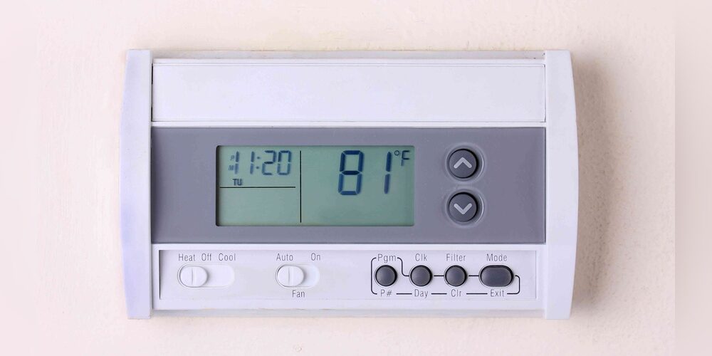 What is Em on Thermostat