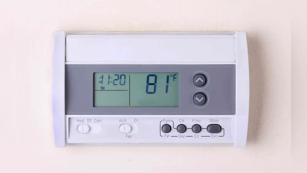 What is Em on Thermostat